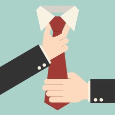 Executive adjusting red tie