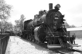 steam locomotive in black and white background