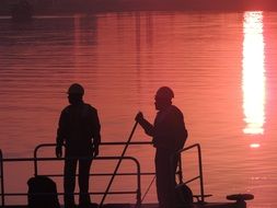 worker industry at sunset