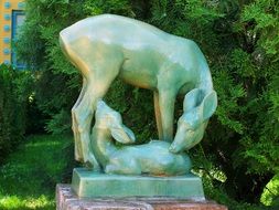 female deer with fawn, stone statue outdoor, hungary, pecs, zsolnay works museum
