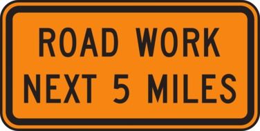 warning sign road works the next 5 miles
