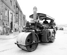 steam roller on road, vintage equipment