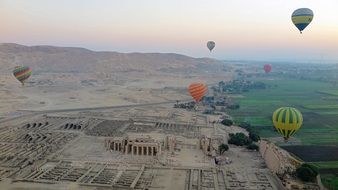 hot air balloons over the luxor