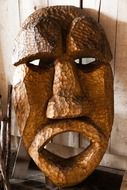 ritual african mask on the wooden wall