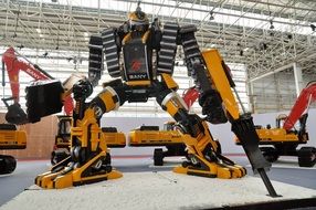 Huge robot among other mechanisms