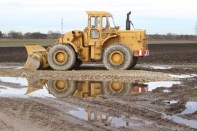 yellow farm tractor