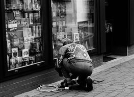 black and white photo of a man while working