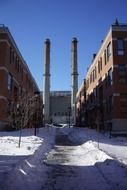 old industrial buildings with chimneys at winter