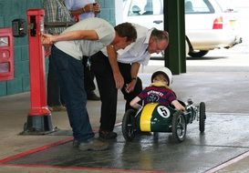 child in a race car