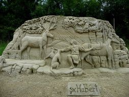 saint hubert and animals, sand statue