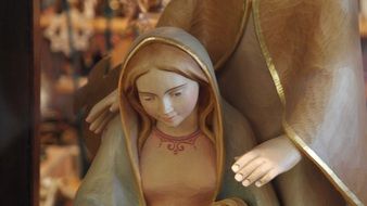 wood carving in the form of the mother of God