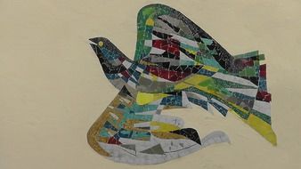 colorful bird made of mosaic