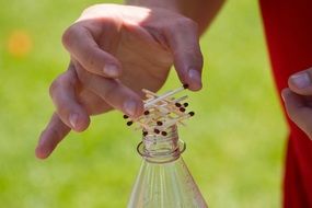 matchstick game on a bottle