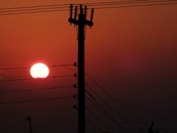 sunset behind power line