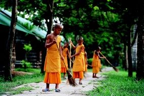 buddhist novices sweep