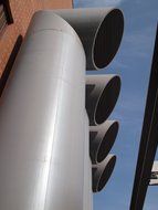 contemporary industrial chimneys in row