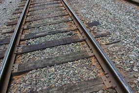 railroad tracks on gravel close up