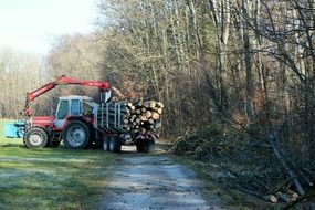 tractor with timber trailer