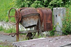 old rusted concrete mixer