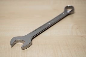 wrench on wooden surface
