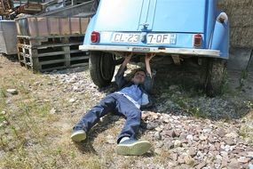 master under the old blue Citroen