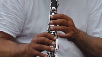 playing a wind instrument