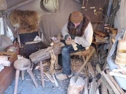 wood carving, senior craftsman at work