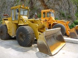 scraper work among rocky terrain