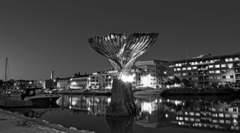 the whale tail, fountain on riverat night, finland, turku