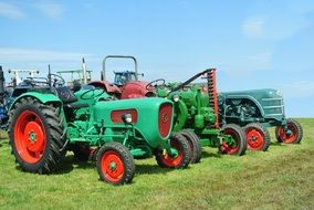 Green tractors on a farm