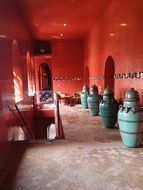 blue flower pots in the red room