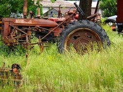 rusty tractor machine on a farm