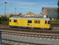 yellow locomotive at the station