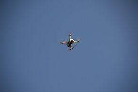 Drone against a clear blue sky