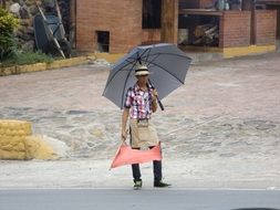 Worker with the umbrella