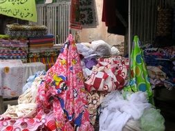 sale of clothes fabrics in bazaar