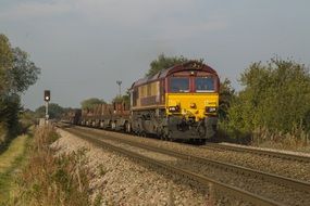 freight locomotive on rails on a sunny day