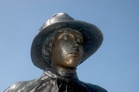 statue of a worker in a hat