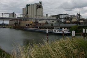 ship on the background of industrial centre of Mannheim