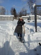 cleaning the road from snow