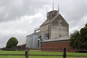 distant view of a silo on a farm