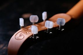 Keys to wrap the strings on the guitar