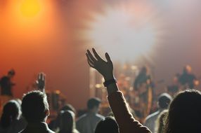people at a concert in bright light