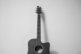guitar music instrument isolated shadow on wall