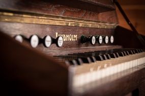 old wooden keyboard instrument