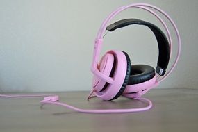 pink and black headphones