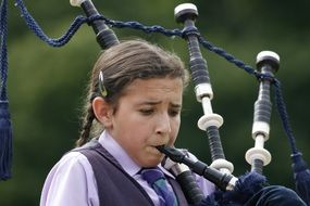 the girl with the force playing the bagpipes