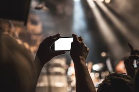 taking picture of a concert