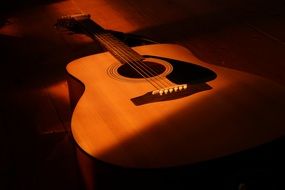 A guitar in the glare of light