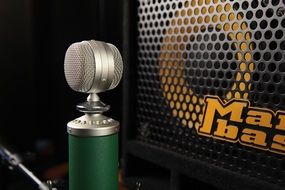 Microphone with a green stand in the studio